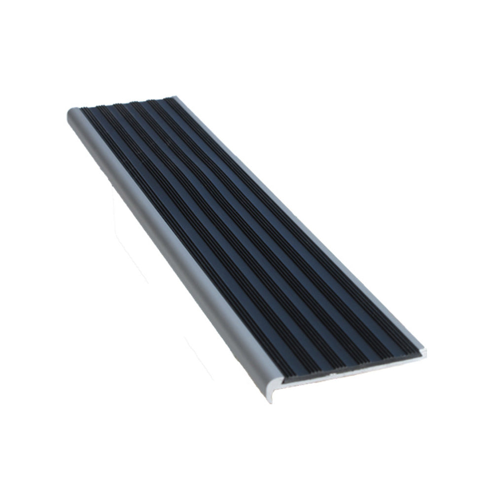 A piece of aluminium recessed stair nosing with a ridged PVC insert, primarily black in color, designed to enhance grip on stairs.
